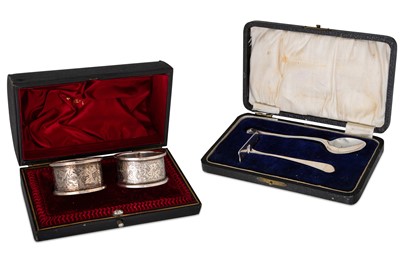 Lot 472 - A PAIR OF CASED SILVER NAPKIN RINGS, Chester...