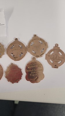 Lot 327 - A COLLECTION OF NINE GAA MEDALS, all 9ct gold...