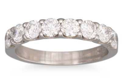 Lot 244 - A DIAMOND HALF ETERNITY RING, the brilliant...