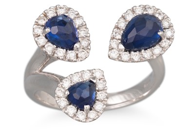 Lot 245 - A DIAMOND AND SAPPHIRE TRIPLE CLUSTER RING, of...