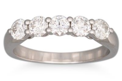 Lot 246 - A DIAMOND FIVE STONE RING, the brilliant cut...