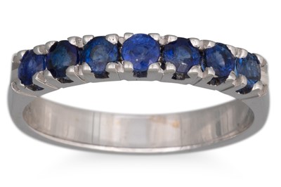 Lot 247 - A SAPPHIRE HALF ETERNITY RING, the circular...