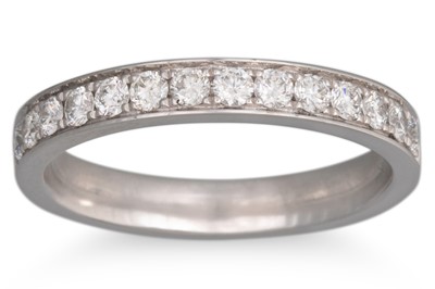 Lot 248 - A DIAMOND HALF ETERNITY RING, the brilliant...