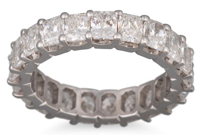 Lot 257 - A RADIANT CUT FULL BANDED ETERNITY RING,...