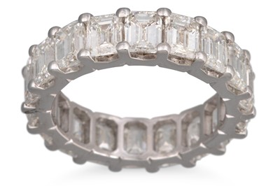 Lot 258 - AN EMERALD CUT FULL BANDED ETERNITY RING,...