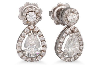 Lot 259 - A PAIR OF DIAMOND DROP EARRINGS, the pear...