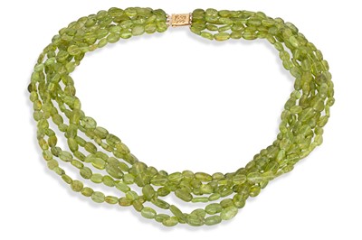 Lot 349 - A MULTI STRANDED PERIDOT BEADED NECKLACE, to a...