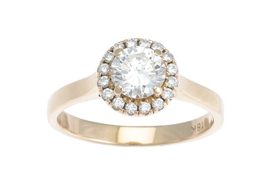 Lot 276 - A DIAMOND 'HALO' CLUSTER RING, mounted in 18ct...