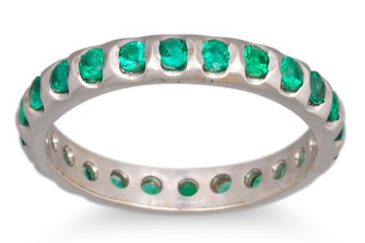 Lot 199 - AN EMERALD SET ETERNITY RING, mounted in 18ct...