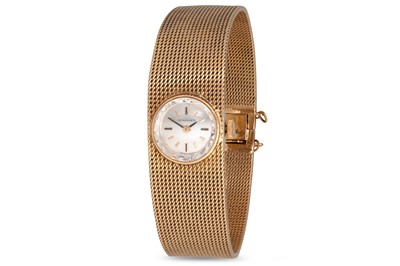 Lot 396 - A LADY'S LONGINES GOLD WRISTWATCH, mesh...