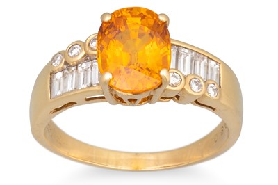 Lot 246 - A SAPPHIRE AND DIAMOND RING, the oval orange...