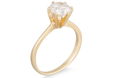 Lot 152 - A DIAMOND SOLITAIRE RING, mounted in yellow...