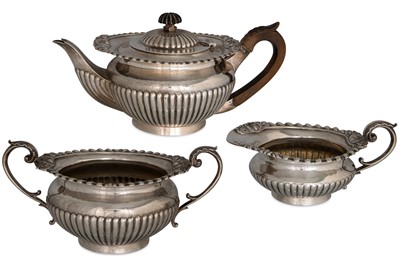 Lot 422 - A THREE PIECE VICTORIAN SILVER TEA SERVICE,...