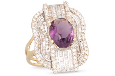 Lot 15 - A DIAMOND AND AMETHYST CLUSTER RING, the oval...