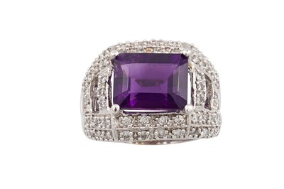 Lot 56 - AN AMETHYST AND DIAMOND CLUSTER RING, the...