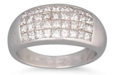 Lot 282 - A CHANNEL SET DIAMOND RING, with princess cut...