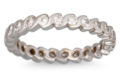 Lot 306 - A DIAMOND ETERNITY RING, the brilliant cut...