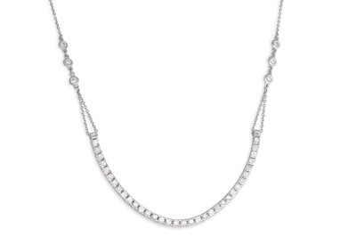 Lot 307 - A DIAMOND NECKLACE, comprising a line of...