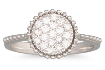 Lot 310 - A PAVÉ SET DIAMOND CLUSTER RING, mounted in...