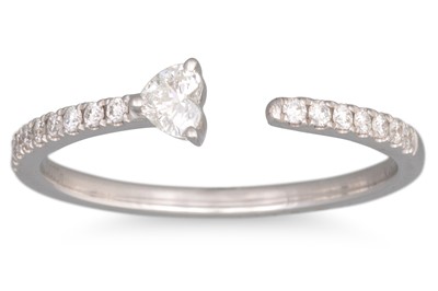 Lot 227 - A DIAMOND SPLIT BAND RING, set with a heart...