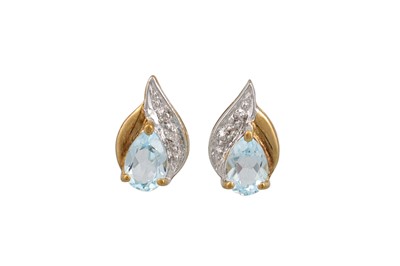 Lot 112 - A PAIR OF DIAMOND AND TOPAZ EARRINGS, mounted...