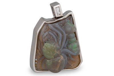 Lot 300 - AN OPAL PENDANT, the carved opal depicting a...