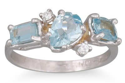 Lot 159 - A THREE STONE AQUAMARINE AND DIAMOND RING, the...