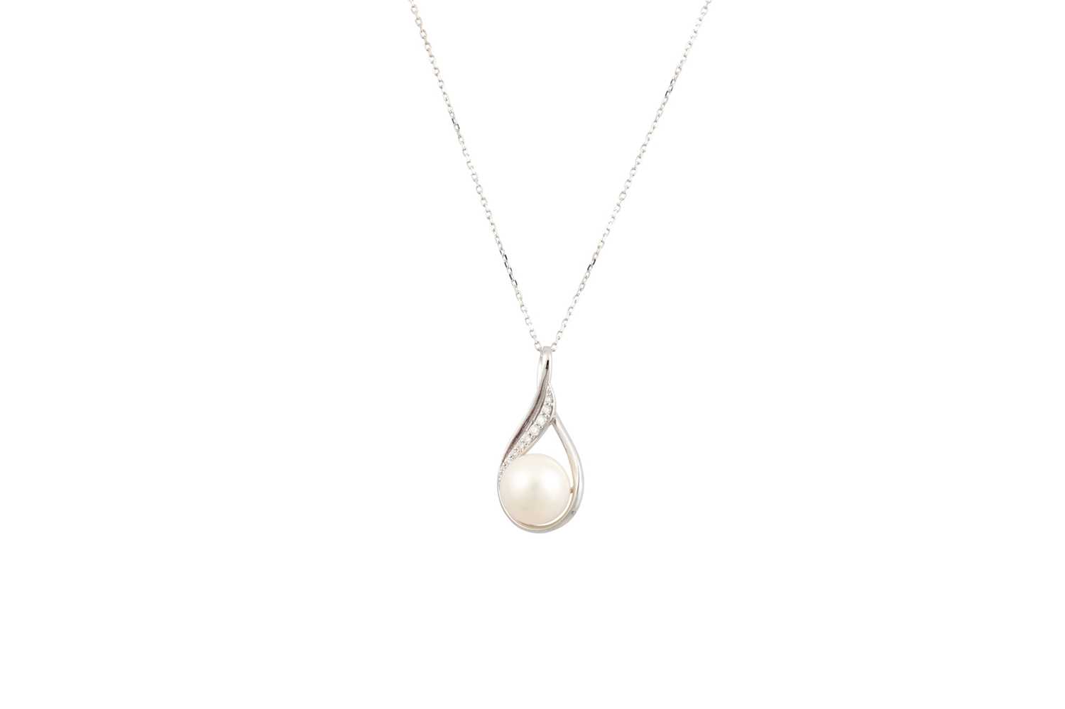 Lot 115 - A LARGE PEARL AND DIAMOND PENDANT, the central...