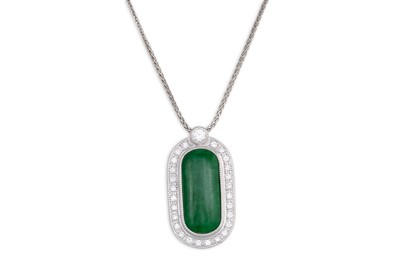 Lot 187 - A JADE AND DIAMOND PENDANT, elongated oval...