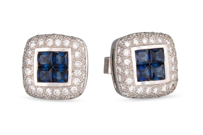 Lot 188 - A PAIR OF DIAMOND AND SAPPHIRE CLUSTER...