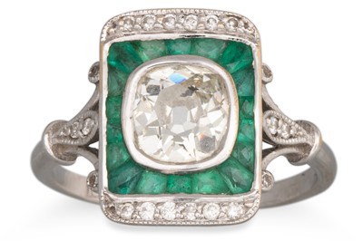 Lot 194 - A DIAMOND AND EMERALD PLAQUE RING, central old...