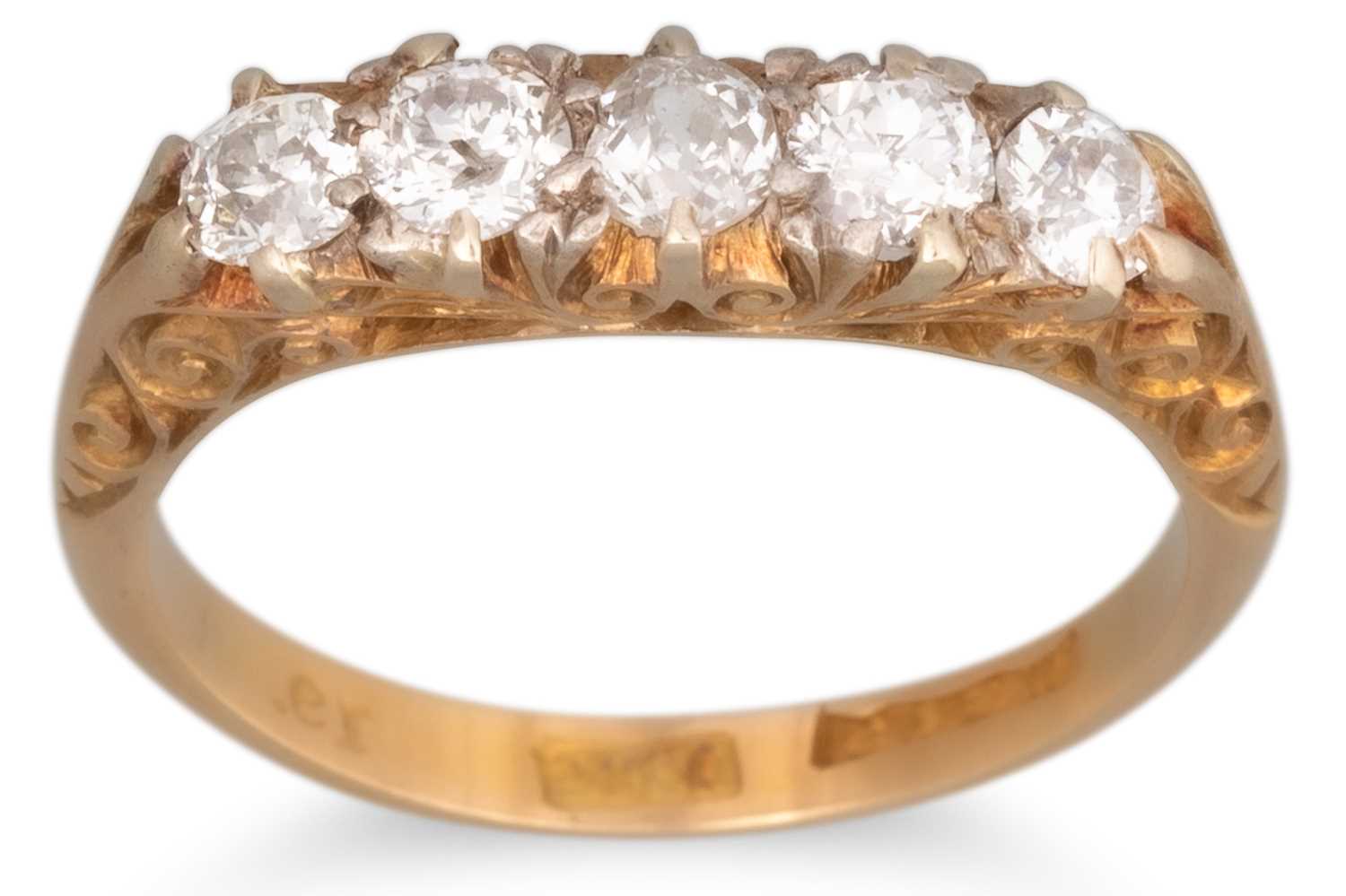Lot 65 - AN ANTIQUE FIVE STONE DIAMOND RING, the old...