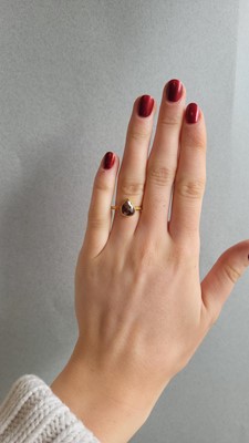 Lot 93 - A COLOURED DIAMOND RING, pear shaped, mounted...