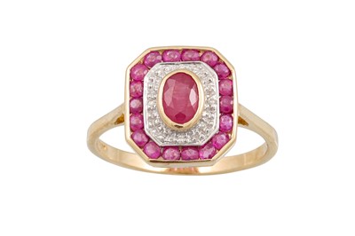 Lot 169 - A DIAMOND AND RUBY CLUSTER RING, octagonal...