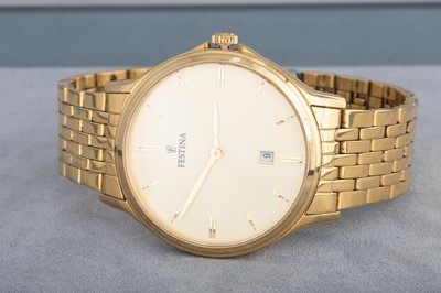 Lot 215 - A GENT'S 'FESTINA' WRISTWATCH, golden face,...