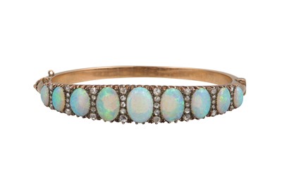 Lot 420 - AN ANTIQUE OPAL AND DIAMOND BANGLE, the...