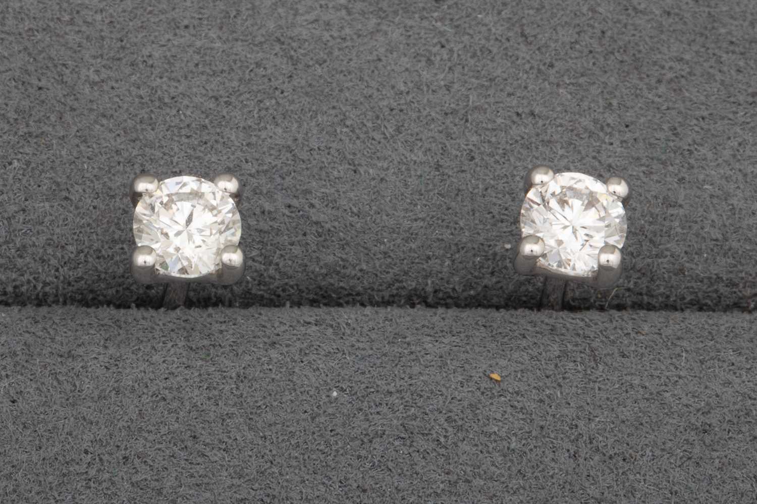 Lot 91 - A PAIR OF DIAMOND STUD EARRINGS, mounted in...