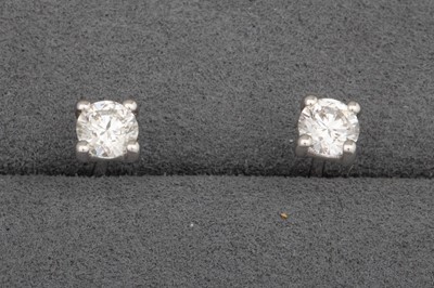 Lot 91 - A PAIR OF DIAMOND STUD EARRINGS, mounted in...