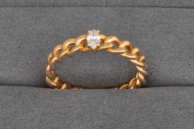 Lot 96 - A CURB LINK RING, with a marquise set diamond,...