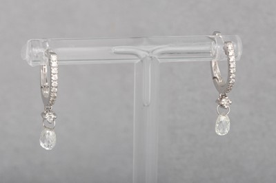 Lot 97 - A PAIR OF DIAMOND SET PAVE 'HUGGIE' SYLE HOOPS,...