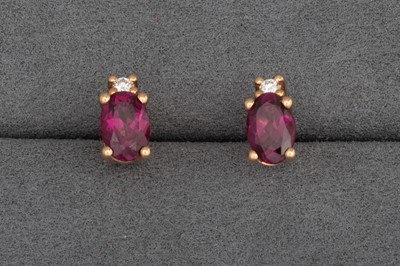 Lot 98 - A PAIR OF GARNET AND DIAMOND STUD EARRINGS,...