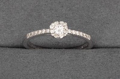 Lot 99 - A DIAMOND CLUSTER RING, mounted in 18ct white...