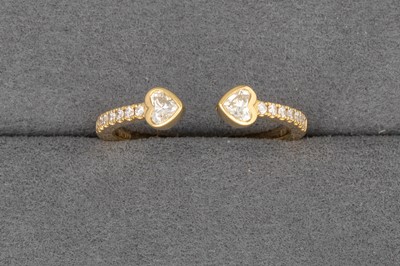 Lot 101 - A DIAMOND SPLIT BAND RING, the pavé set band...