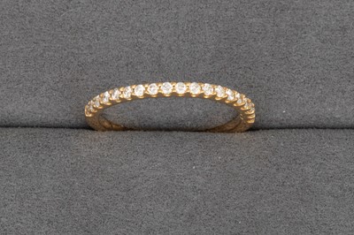 Lot 105 - A DIAMOND HALF ETERNITY RING, mounted in 18ct...