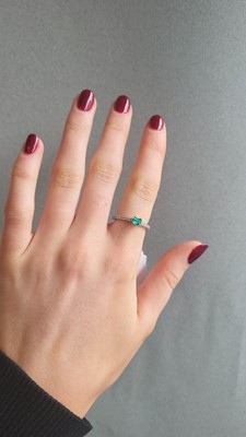 Lot 151 - AN EMERALD AND DIAMOND RING, the rectangular...