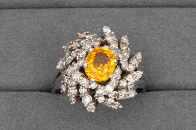 Lot 5 - A CITRINE AND DIAMOND COCKTAIL RING, the oval...