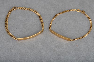 Lot 9 - TWO 18CT GOLD BRACELETS, ID style, gross...