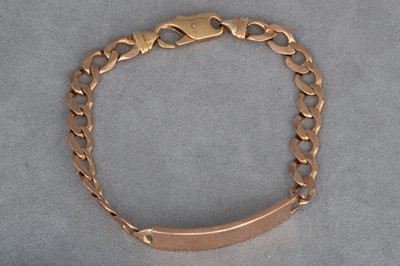 Lot 41 - A 9CT GOLD ID BRACELET, 24.8g