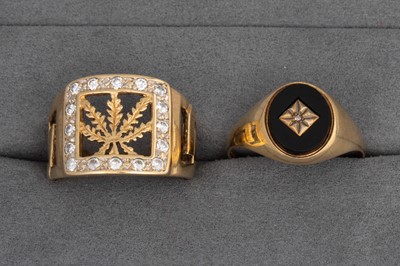 Lot 42 - TWO 9CT GOLD GENTS RINGS, one onyx set