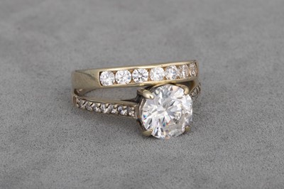 Lot 50 - TWO 9CT GOLD DRESS RINGS, stone set. Sizes: L...